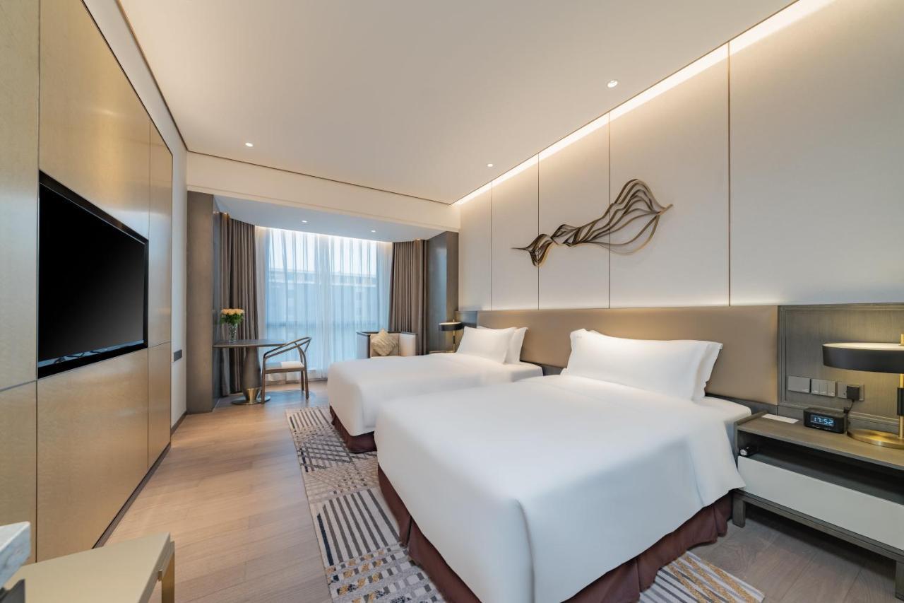 Holiday Inn Zhengzhou Zhongzhou By Ihg Exterior photo