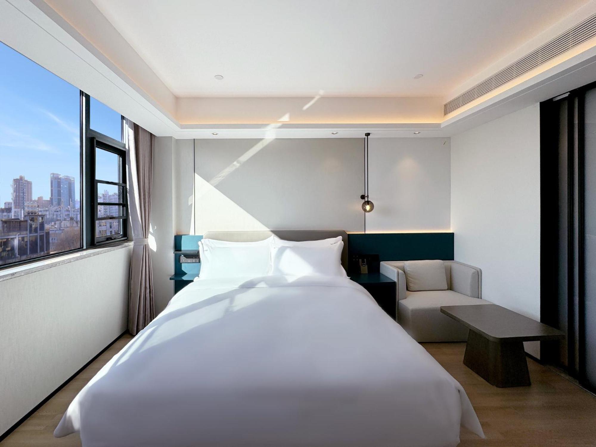 Holiday Inn Zhengzhou Zhongzhou By Ihg Exterior photo